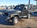 1997 Jeep Wrangler — photo 2 of 21 | VIN 1J4FY19S9VP515763