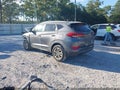 2016 Hyundai Tucson — photo 3 of 17 | VIN KM8J33A40GU179315