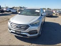 2017 Hyundai Santa Fe — photo 2 of 16 | VIN 5XYZT3LB8HG457349