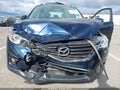 2016 Mazda CX-5 — photo 6 of 16 | VIN JM3KE2CYXG0648115