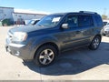 2011 Honda Pilot — photo 2 of 14 | VIN 5FNYF4H72BB103340