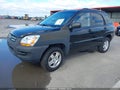 2007 Kia Sportage — photo 2 of 11 | VIN KNDJF724577433357