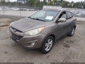2013 Hyundai Tucson — photo 2 of 10 | VIN KM8JU3AC4DU549844