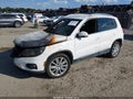 2014 Volkswagen Tiguan — photo 2 of 10 | VIN WVGAV3AX1EW502907