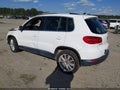 2014 Volkswagen Tiguan — photo 3 of 10 | VIN WVGAV3AX1EW502907