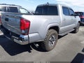 2018 Toyota Tacoma — photo 4 of 16 | VIN 5TFAX5GN4JX125624
