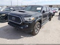 2018 Toyota Tacoma — photo 2 of 16 | VIN 3TMDZ5BN9JM053565