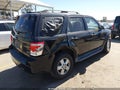 2010 Ford Escape — photo 4 of 12 | VIN 1FMCU0D74AKA63130