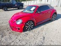 2014 Volkswagen Beetle — photo 2 of 16 | VIN 3VW7T7ATXEM803987