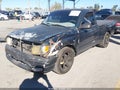 2004 Toyota Tacoma — photo 2 of 17 | VIN 5TENL42N34Z308153