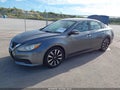 2018 Nissan Altima — photo 2 of 18 | VIN 1N4AL3APXJC168856