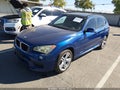 2014 BMW X1 — photo 2 of 11 | VIN WBAVM1C50EVW47450
