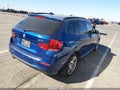 2014 BMW X1 — photo 4 of 11 | VIN WBAVM1C50EVW47450