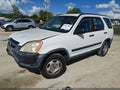 2004 Honda CR-V — photo 2 of 16 | VIN SHSRD68454U209174