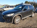 2014 Mazda CX-5 — photo 2 of 16 | VIN JM3KE4CY3E0417016