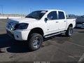 2008 Nissan Titan — photo 2 of 17 | VIN 1N6AA07C88N353826