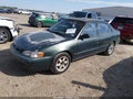 2000 Toyota Corolla — photo 2 of 11 | VIN 1NXBR12EXYZ334775