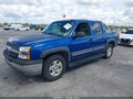 2003 Chevrolet Avalanche — photo 2 of 11 | VIN 3GNEC13T23G330500