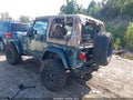 1999 Jeep Wrangler — photo 3 of 16 | VIN 1J4FY49S7XP440582