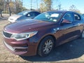 2016 Kia Optima — photo 6 of 17 | VIN 5XXGT4L32GG030967