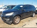 2013 Chevrolet Traverse — photo 2 of 11 | VIN 1GNKVGKDXDJ194112