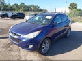 2012 Hyundai Tucson — photo 2 of 11 | VIN KM8JU3AC9CU404667
