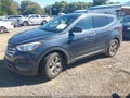 2016 Hyundai Santa Fe — photo 2 of 16 | VIN 5XYZT3LBXGG371958