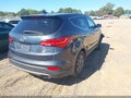 2016 Hyundai Santa Fe — photo 4 of 16 | VIN 5XYZT3LBXGG371958