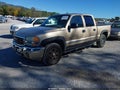 2006 GMC Sierra 1500 — photo 2 of 14 | VIN 2GTEK13T761212158