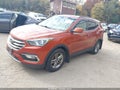 2017 Hyundai Santa Fe — photo 2 of 16 | VIN 5XYZUDLB9HG468332