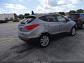 2010 Hyundai Tucson — photo 4 of 12 | VIN KM8JU3ACXAU018157