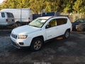 2014 Jeep Compass — photo 2 of 12 | VIN 1C4NJCBA5ED881711