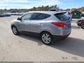 2013 Hyundai Tucson — photo 3 of 11 | VIN KM8JUCAC1DU711509