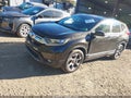 2018 Honda CR-V — photo 2 of 16 | VIN 2HKRW2H57JH700104