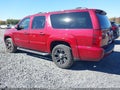 2010 Chevrolet Suburban 1500 — photo 3 of 17 | VIN 1GNUKJE38AR210922
