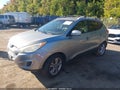 2012 Hyundai Tucson — photo 2 of 11 | VIN KM8JU3AC6CU460517