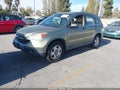 2007 Honda CR-V — photo 2 of 12 | VIN 5J6RE48347L009611