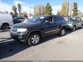 2012 Jeep Grand Cherokee — photo 2 of 11 | VIN 1C4RJEAG8DC550290