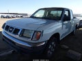 1999 Nissan Frontier — photo 2 of 11 | VIN 1N6DD26S7XC341962