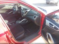 2016 Hyundai Veloster — photo 5 of 11 | VIN KMHTC6AD2GU282973