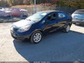 2013 Kia Rio — photo 2 of 15 | VIN KNADM4A38D6224994