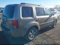 2011 Honda Pilot — photo 4 of 11 | VIN 5FNYF4H41BB031911