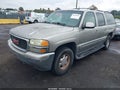 2003 GMC Yukon XL — photo 2 of 11 | VIN 1GKFK16T63J342874