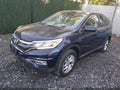 2015 Honda CR-V — photo 2 of 17 | VIN 5J6RM4H58FL048737