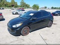 2013 Hyundai Accent — photo 2 of 11 | VIN KMHCT5AE2DU089995