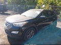 2016 Hyundai Santa Fe — photo 2 of 11 | VIN 5XYZU3LB7GG307051