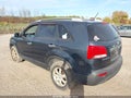 2011 Kia Sorento — photo 3 of 11 | VIN 5XYKTCA11BG099174