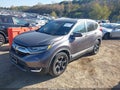 2018 Honda CR-V — photo 2 of 16 | VIN 7FARW2H9XJE089944