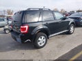 2009 Ford Escape — photo 4 of 11 | VIN 1FMCU93G29KC31252