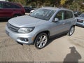 2013 Volkswagen Tiguan — photo 2 of 11 | VIN WVGAV3AX7DW604680